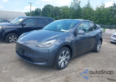 2023 Tesla Model Y Awd/Long Range Dual Motor All-Wheel Drive z USA, uszkodzony, nr VIN 7SAYGDEE3PF879552